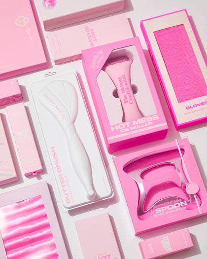 Pink skincare beauty product packaging flatlay